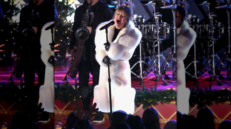 Kelly Clarkson in a white coat