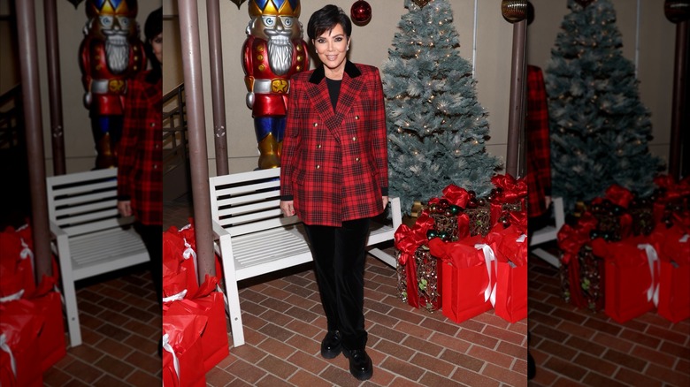 Kris Jenner in a red plaid jacket
