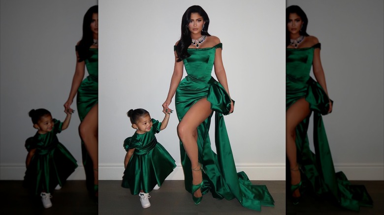 Kylie Jenner and Stormi Webster in matching green dresses