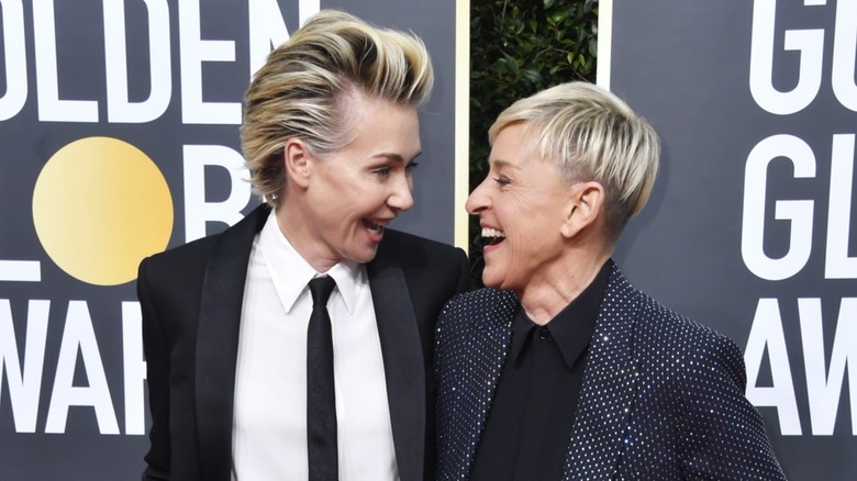 Portia de Rossi looking at Ellen DeGeneres on the red carpet