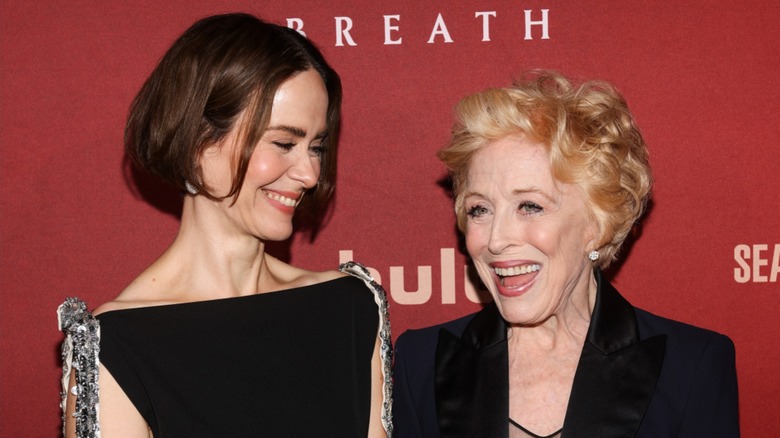 Sarah Paulson smiling at Holland Taylor on the red carpet
