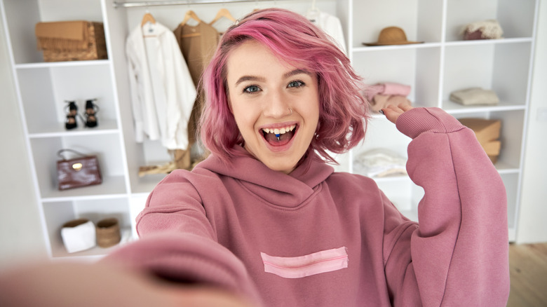 Woman in front of her wardrobe