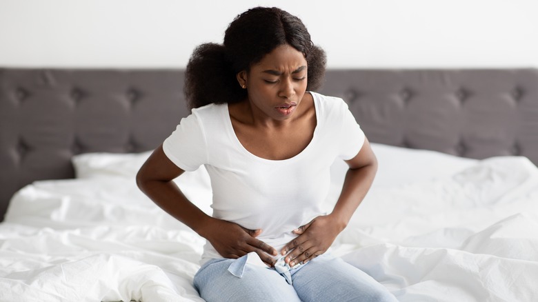 Person experiencing period cramps