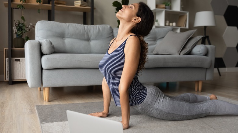 Woman in cobra pose