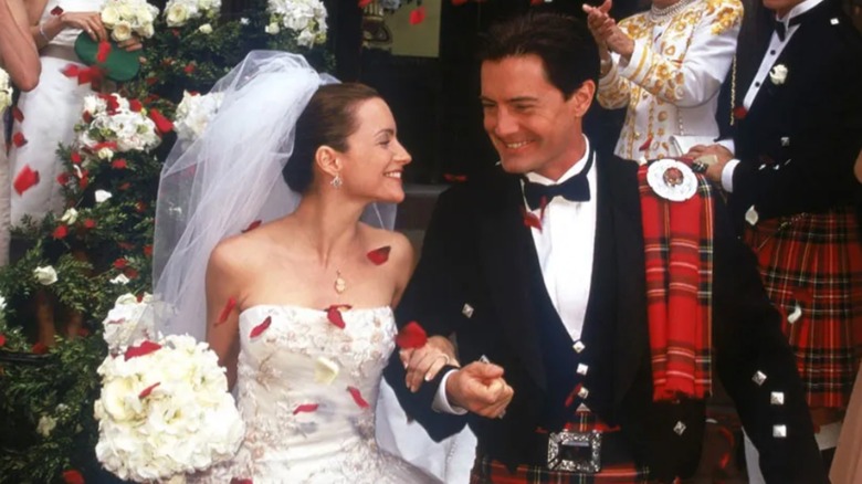 Kristin Davis as Charlotte York wearing a white vera wang dress