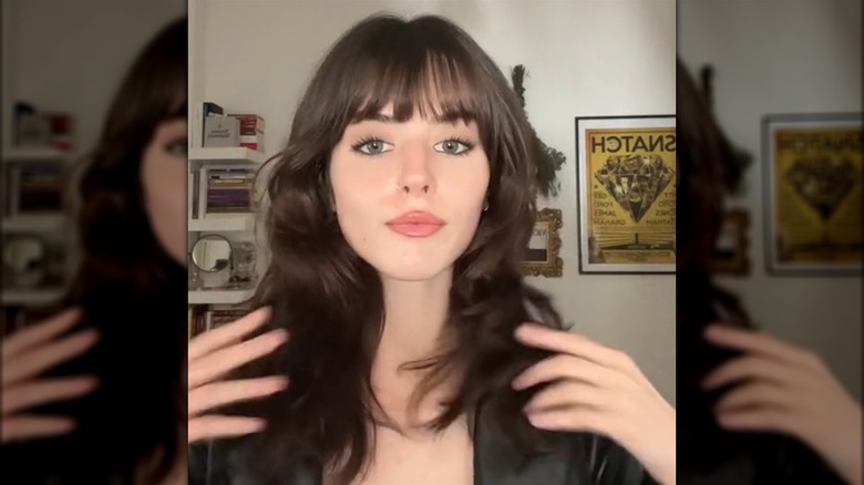 Woman with soft wolf cut hair