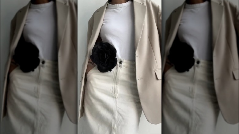 Floral broach on a white outfit