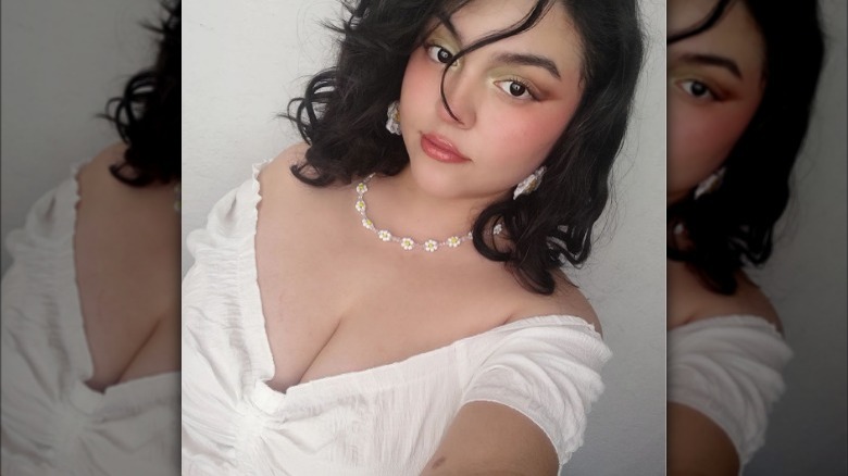 Woman wearing floral necklace