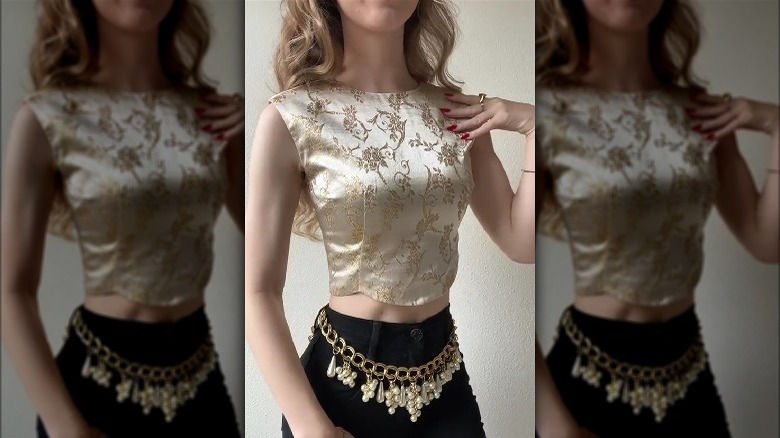 Woman wearing metallic top