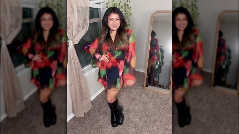 Woman in blurred floral dress