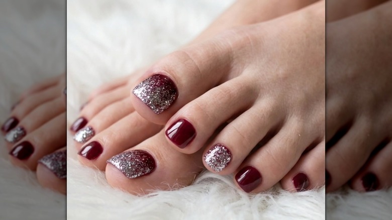A woman with a sparkly red pedicure on Instagram