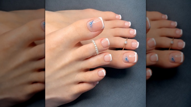 A bridal pedicure with blue detailing