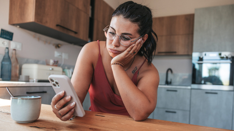 Woman looking at her phone