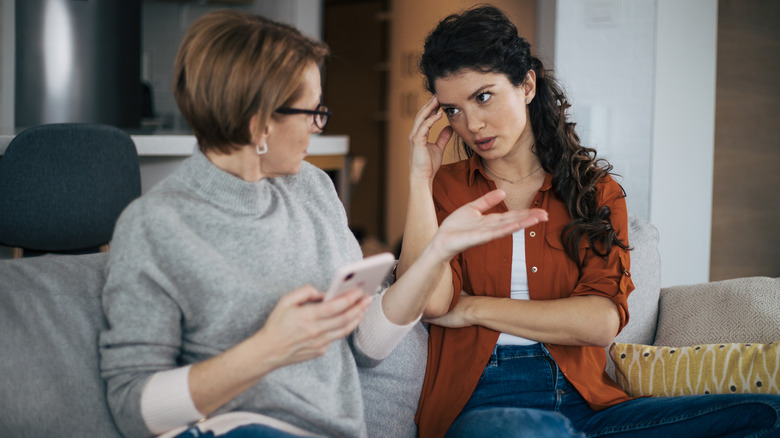 Mom talking to her daughter