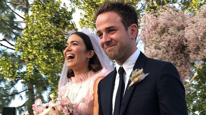 Mandy Moore and her husband at their wedding