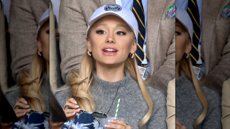 Ariana Grande watches Carlos Alcaraz vs Novak Djokovic in the Wimbledon 2023 men's final on Centre Court during day fourteen of the Wimbledon Tennis Championships at All England Lawn Tennis and Croquet Club on July 16, 2023 in London, England