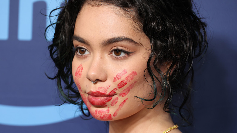 Auli'i Cravalho, red hand print