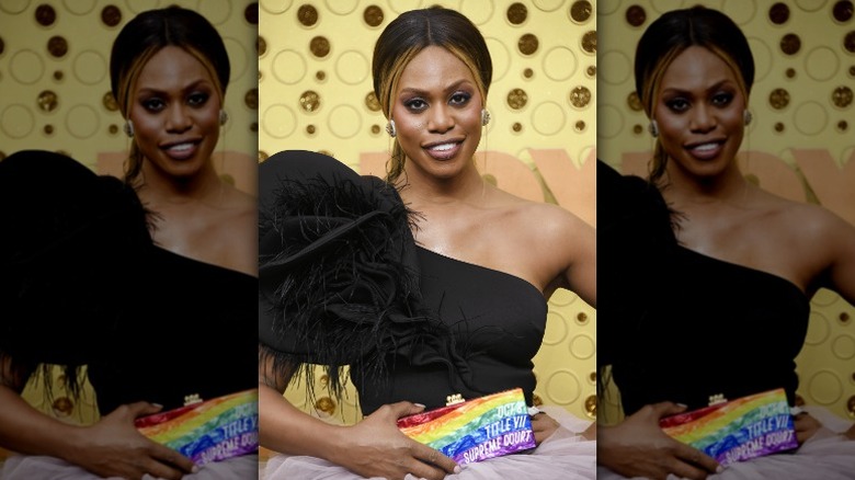 Laverne Cox with trans rights clutch