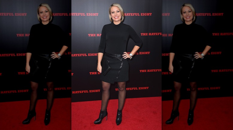 Dylan Dreyer smiling on the red carpet of the New York premiere of "The Hateful Eight" in December 2015, wearing a black skirt, black top, and black heeled boots
