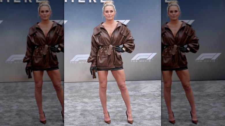 Lindsey Vonn wearing a leather coat and miniskirt at the world premiere of "F1"