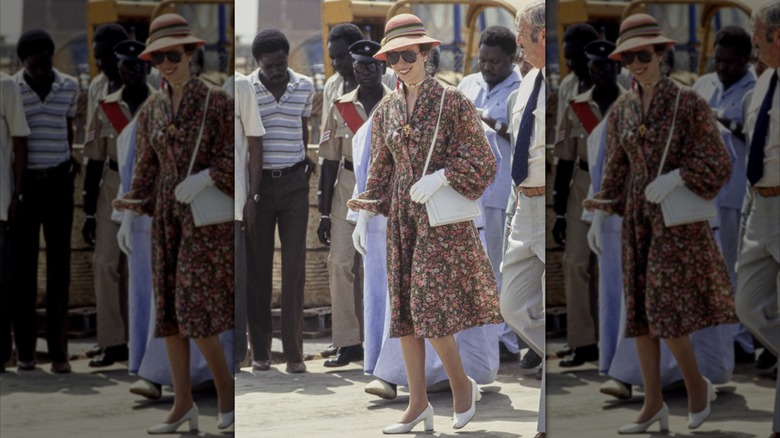 Princess Anne, Princess Royal wearing a floral print, bow-front outfit in Gambia in 1984