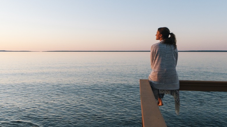 A woman looking out toward the ocean