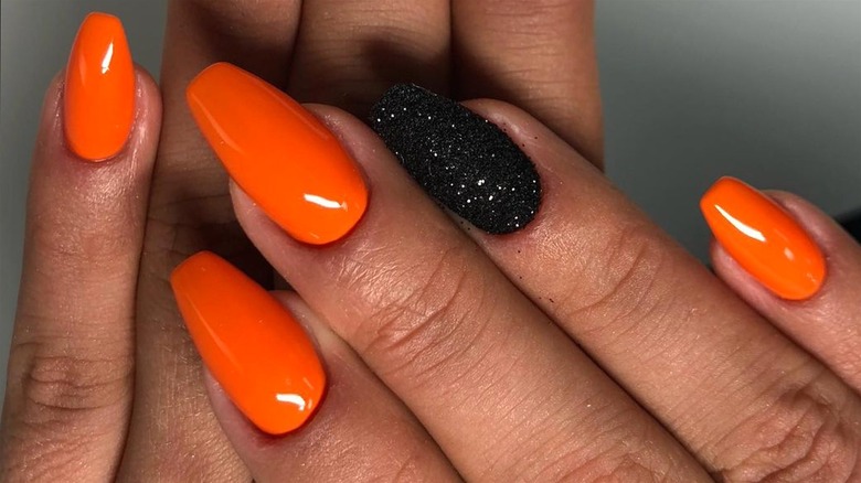 Orange and black nails