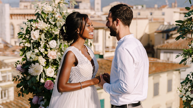 Couple getting married on rooftop