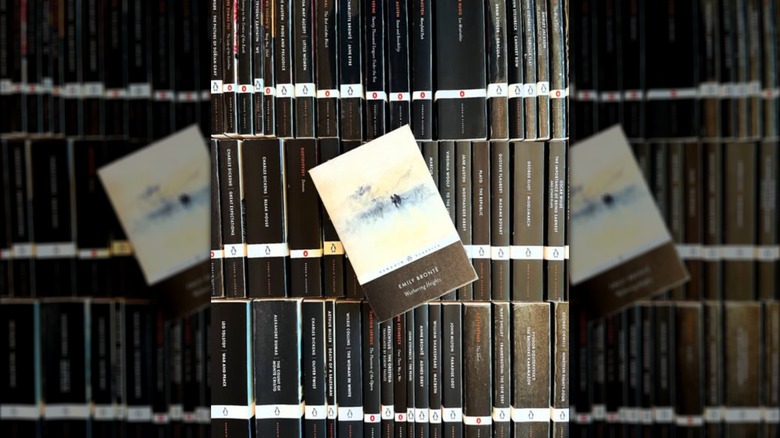 A copy of the novel "Wuthering Heights" on top of a stack of other books
