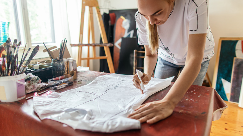 Woman marking shirt