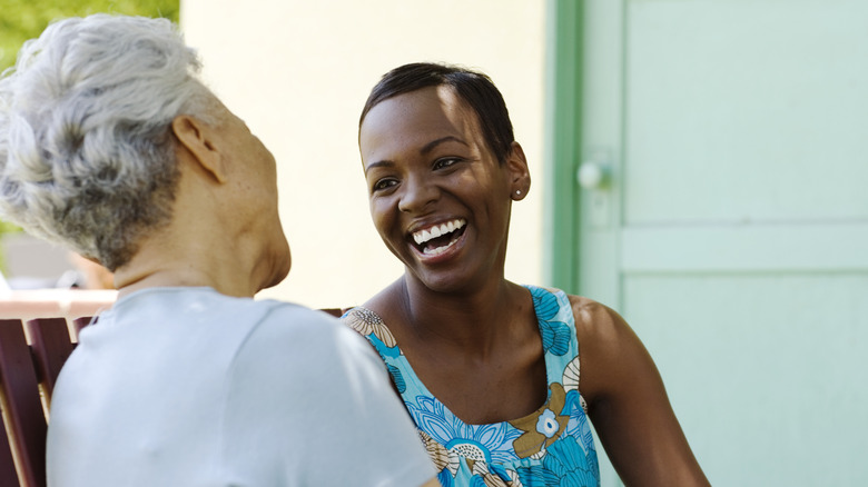 Two women smiling