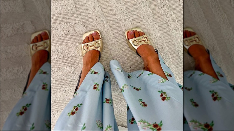 Person wearing mules