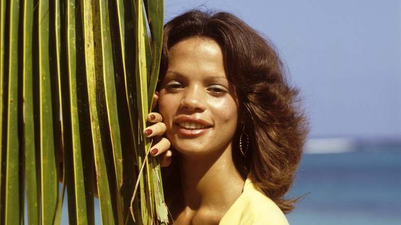 A woman with curtain bangs