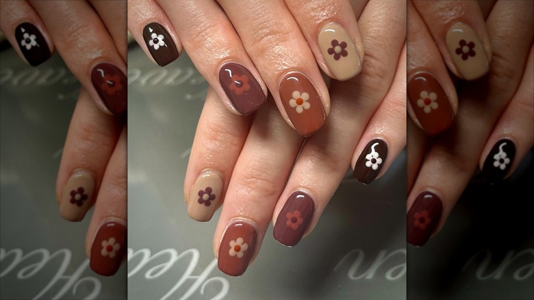 Ombre brown floral nails inspired by the 1970s