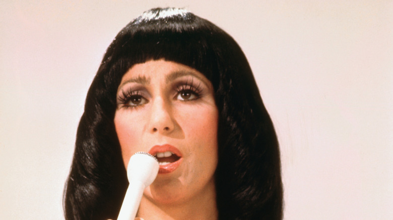 Cher with super spiky, long lashes