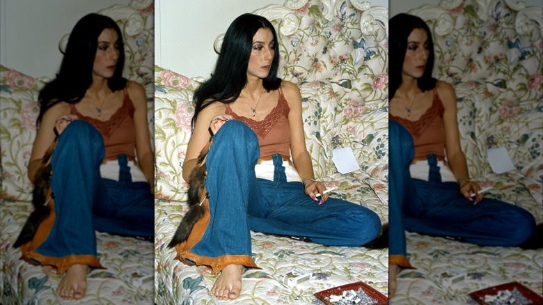 Cher wearing flared jeans in the 1970s