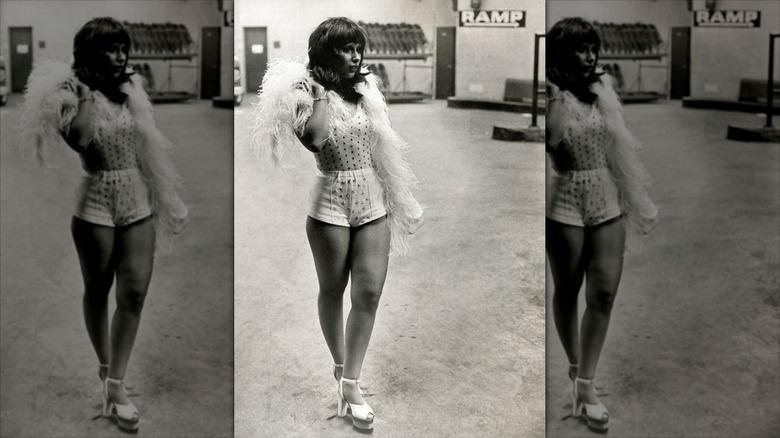A woman in 1972 wearing bedazzled hot pants