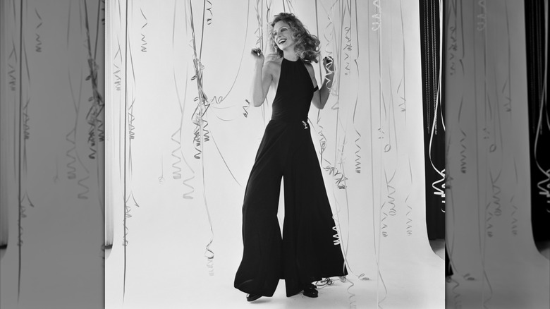 A woman wearing a wide-leg jumpsuit during a 1971 photo shoot