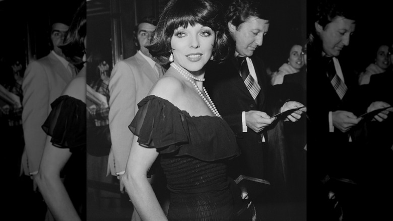 Joan Collins wearing pearls in 1972