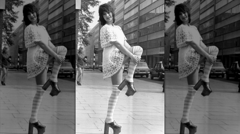 A woman wearing platform heels in the 1970s