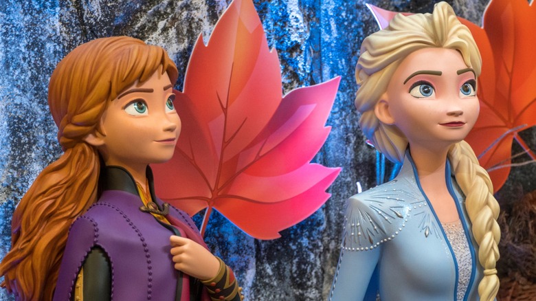 Frozen's Anna and Elsa animatronics standing side by side