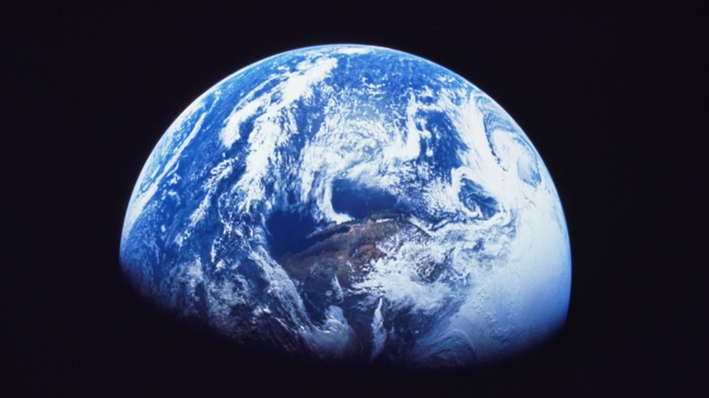 The Earth from space with half in shadow