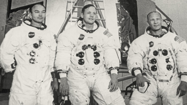 Black-and-white photo of the Apollo 11 astronauts Neil Armstrong, Buzz Aldrin, and Michael Collins in 1969