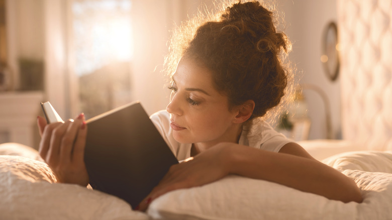 woman reading book 