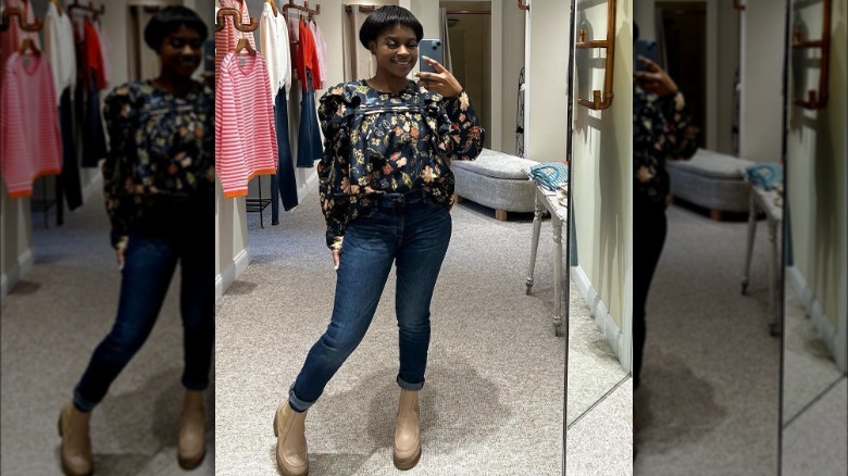 A woman taking a mirror selfie