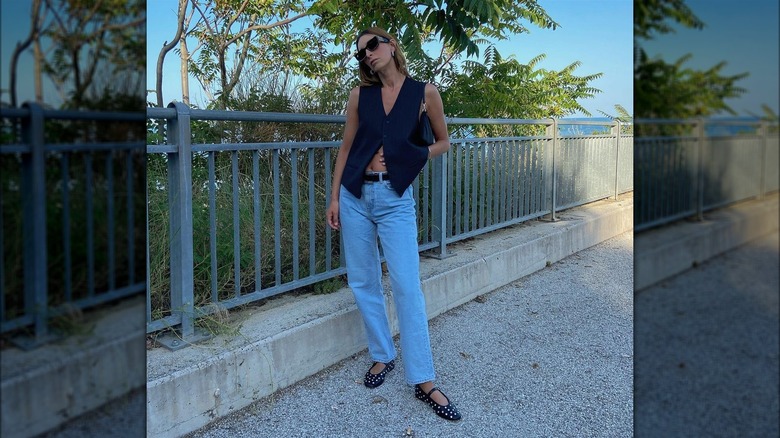 Woman wearing Mary Janes and jeans