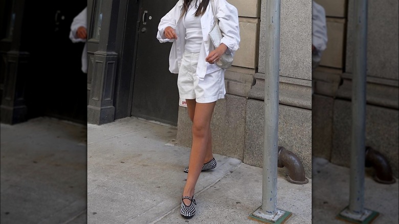 Woman wearing studded Mary Janes