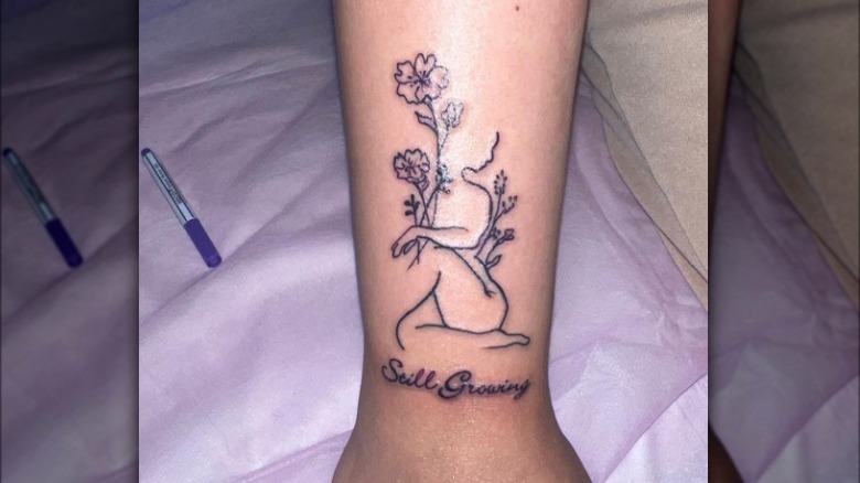 Still growing line tattoo