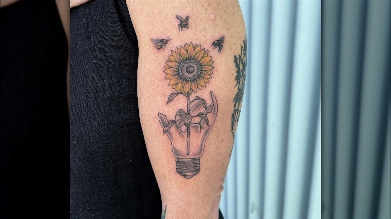 Sunflower and light bulb tattoo