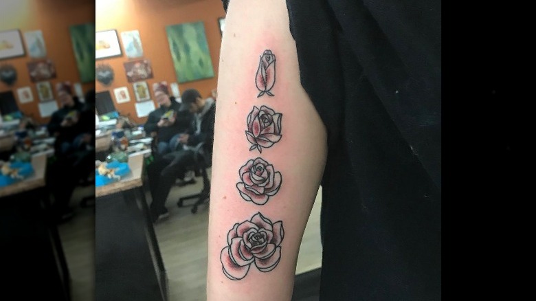 Rose blooming stages tattoo